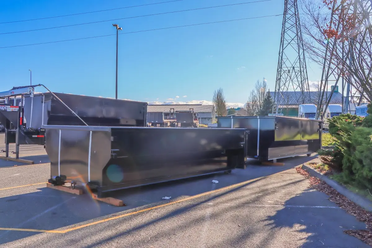 Roll-off dumpster ready for waste disposal at job site for Concrete Dumpster Rental in Mount Horeb